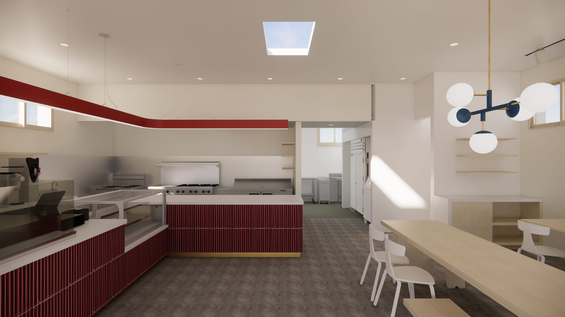 Open kitchen line with terrazzo counter and banquette seating
